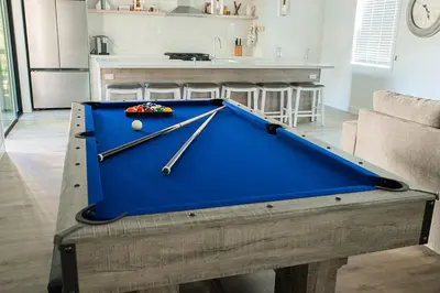 a pool table in the middle of a living room at Bearadise, LuxuryNew Build, Central, Hot Tub, EV ,Games in Big Bear Lake