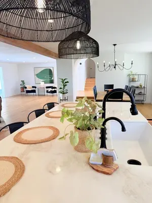 a kitchen with a table with plants on it at Lavender House - Serene Ojai Retreat, Pool, Orchard in Ojai