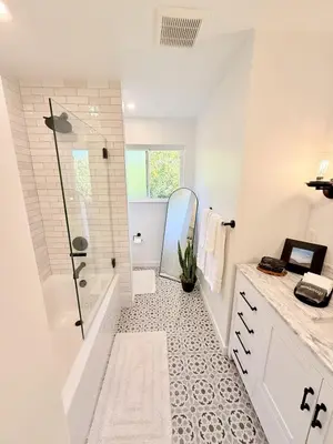 a white bathroom with a shower and a sink at Lavender House - Serene Ojai Retreat, Pool, Orchard in Ojai