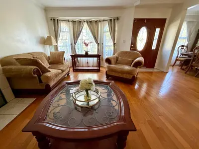 a living room with a couch and a coffee table at Dream House Retreat LLC in Los Angeles