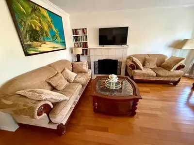 a living room with a couch and a coffee table at Dream House Retreat LLC in Los Angeles
