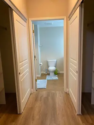 an empty bathroom with a toilet in a room at Modern 2BD Apartment with 2 Baths in Alhambra in Alhambra