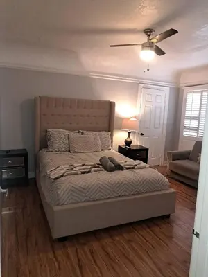 a bedroom with a bed and a ceiling fan at Amazing 3 bedrooms with 3 bedroom apt in the center of Beverly Hills in Los Angeles