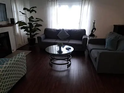a living room with a couch and a coffee table at 3 bedroom plus 2 baths in Beverly hills in Los Angeles