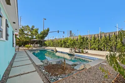 a swimming pool in the backyard of a house at Luxury Pool Oasis- Near Stadium, Tennis and Golf in Pasadena