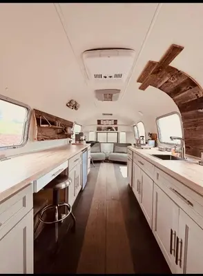 an interior view of a kitchen in an rv at Zaromelranch
