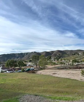 a view of a field with mountains in the background at Zaromelranch