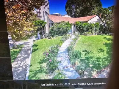 a picture of a yard with a house at The Rochester house in Los Angeles