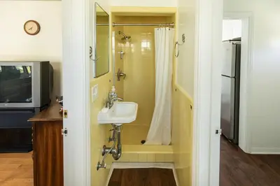 a bathroom with a sink and a shower at The Rochester house in Los Angeles