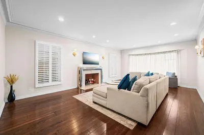 a living room with a couch and a fireplace at Spacious 5BR LA Villa with Pool Spa & Game Room in Los Angeles