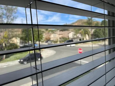 a window with a view of a street at LA Lux Suite with Private Bathroom in Santa Clarita