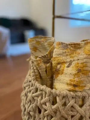 a woven basket sitting on top of a wooden floor at LA Lux Suite with Private Bathroom in Santa Clarita