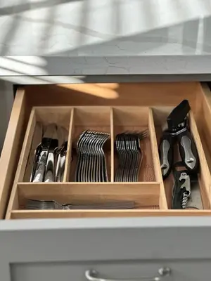 a drawer filled with utensils in a cabinet at Walkable to SoFi, Intuit Dome, Kia Forum World Cup in Inglewood