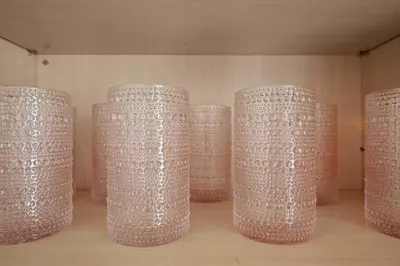 a group of glass cups sitting on a shelf at Remodeled 1BR LA Apartment with full kitchen in Los Angeles