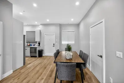 a dining room and kitchen with a table and chairs at #01 Spacious 3B3B Near Koreatown & Hollywood, Central LA in Los Angeles