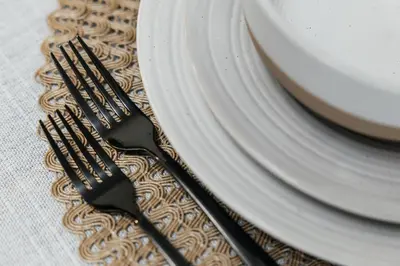 a fork sitting next to a plate on a table at Cute 1Bedroom apartment with pool view, parking and GYM in Los Angeles