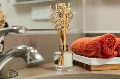 a bottle of essential oils on a kitchen sink at Cute 1Bedroom apartment with pool view, parking and GYM in Los Angeles