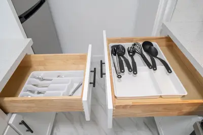 a wooden drawer with utensils in a kitchen at LuxuryCondo DTAlhambra Near Starbucks Free2Parking in Alhambra