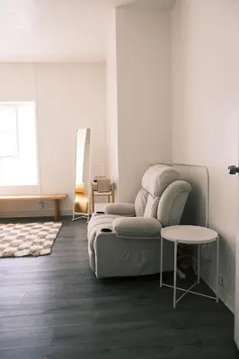 a living room with a couch and a table at Paradise Knowhere in Los Angeles