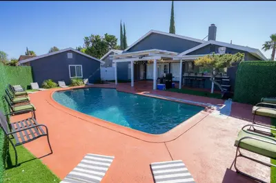 a swimming pool in the backyard of a house at silver in Chatsworth