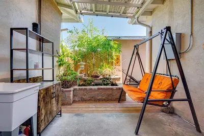 a hammock in a room with a garden at Explore Shops, Eats and Entertainment! Pasadena Apt in Pasadena