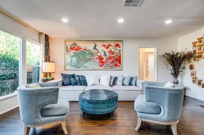 a living room with a couch and two chairs at Peacock House Sanctuary 4 Mi to Old Pasadena! in Pasadena