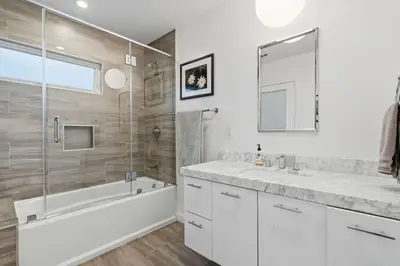 a bathroom with a tub and a sink and a shower at New Listing West LA Urban Oasis by Colby & Conrad in Los Angeles