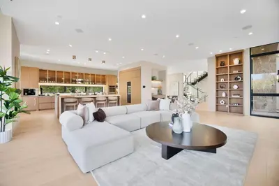 a living room with a white couch and a table at Amestoy Modern in Los Angeles