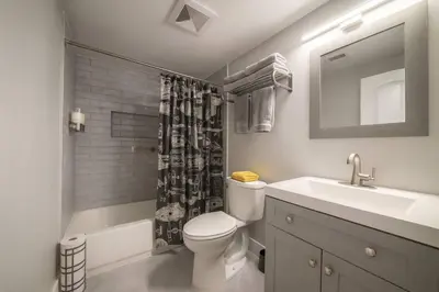 a bathroom with a toilet and a sink and a shower at Star Wars Retreat by OC Adventure Homes in Garden Grove