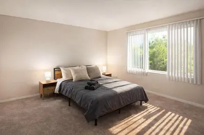 a bedroom with a bed and a large window at Serenity Close To Marina Docks - Short Trip To Venice Beach in Los Angeles