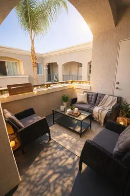 a living room with a couch and a table at Marina Del Rey 2BR-2BA & 1 BR-1BA - Easy Trip To Venice Boardwalk in Los Angeles