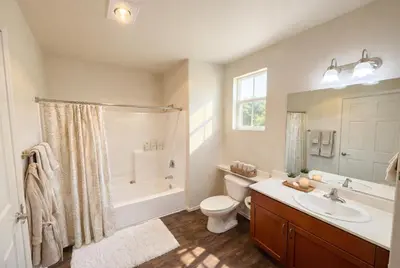 a bathroom with a tub and a toilet and a sink at Marina Breeze Retreat 2BR 2BA - Close To Venice Beach in Los Angeles