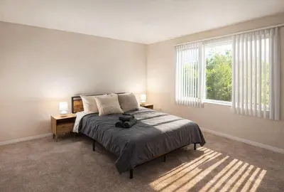 a bedroom with a bed and a window at Boardwalk & Marina Retreat in Los Angeles