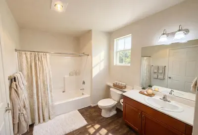a bathroom with a sink and a toilet and a shower at Boardwalk & Marina Retreat in Los Angeles