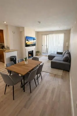 a living room with a table and chairs and a couch at Marina del Rey Prime 2BR-2BA Location Near Venice Beach in Los Angeles