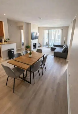 a living room with a wooden table and chairs at Marina del Rey 2BR-2BA Near Venice Boardwalk in Los Angeles