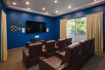 a waiting room with chairs and a flat screen tv at Marina del Rey 1BR Hideaway - Venice Beach in Los Angeles