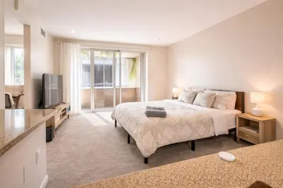 a large bedroom with a bed and a television at Marina del Rey 1BR Escape & Venice Beach in Los Angeles
