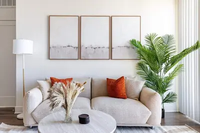 a living room with a couch and a table at Sleek Marina Den, Central, Gym, Pool, King Bed in Los Angeles