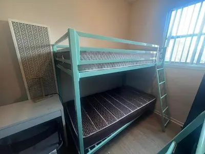 an empty bunk bed in a room at Bunk bed spot available, Central LA in Los Angeles