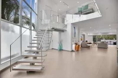 a staircase in a house with a living room at Colgate Vantage in Los Angeles