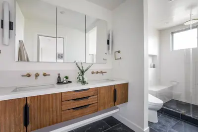 a bathroom with a sink and a toilet at Pacific Breeze - Modern Venice Beach Home in Los Angeles