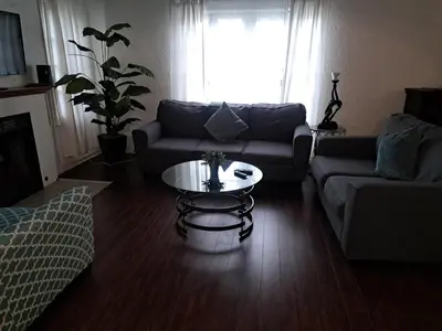 a living room with a couch and a coffee table at 3 bedroom plus 2 baths in Beverly hills in Los Angeles