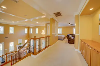a large hallway with a staircase in a house at Resort-Style Oasis Expansive Riverside Mansion in Riverside