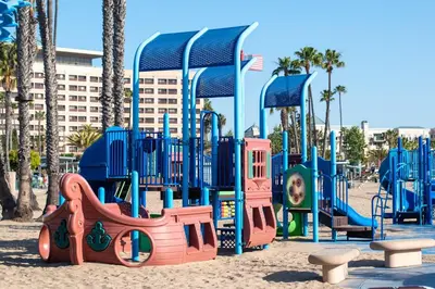 a playground in the sand in a park at Drift & Dream - Opulent 1BR Marina Escape in Los Angeles