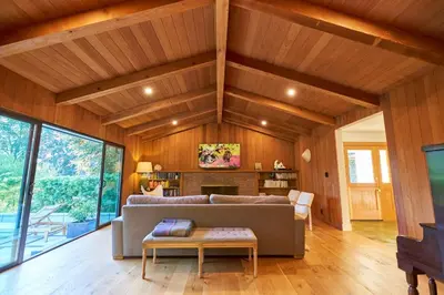 a living room with a couch and a table at Rancho Palomar in Ojai