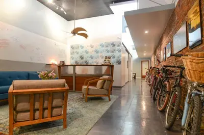 a waiting room with bikes on the wall at Hotel Royal in Long Beach