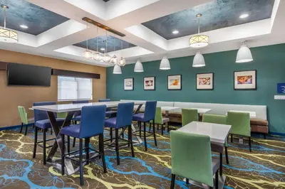 a large dining room with tables and chairs at Best Western Plus Taft Inn in Taft
