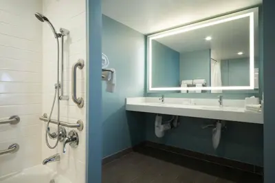 a bathroom with a sink and a mirror at Fairfield Inn & Suites By Marriott Camarillo in Camarillo