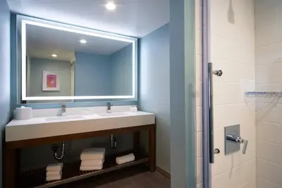 a bathroom with a sink and a mirror at Fairfield Inn & Suites By Marriott Camarillo in Camarillo